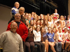 Past and current directors, left from bottom to top, Dan White, Marc Burrowes, George Alexander and and Gavin Hall, pose with the cast and crew of this year's SCITS Review. This year's review performances run March 3, 4 and 5 in the auditorium of the high school on Wellington Street in Sarnia. (Handout/Sarnia Observer/Postmedia Network)