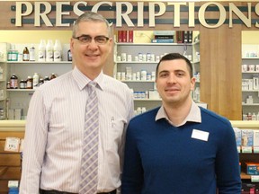 Craig Brown, left, stands with Scott Gillingham. Brown, who has been a pharmacist in Vermilion for 34 years, sold his business, Apple Drugs, to Shoppers Drug Mart. Gillingham will act as the new owner and pharmacist.