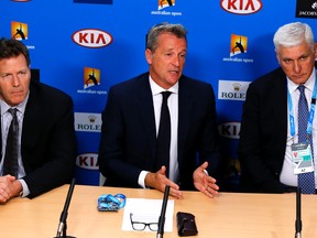 ATP president Chris Kermode, centre, speaks during a press conference at the Australian Open in Melbourne, Australia, Monday, Jan. 18, 2016. At right is Nigel Willerton, head of the Tennis Integrity Unit. At left is ATP Vice Chairman Mark Young. (AP Photo/Shuji Kajiyama)