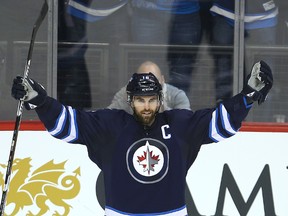 Winnipeg Jets left winger Andrew Ladd celebrates his second period goal against the Dallas Stars during NHL hockey in Winnipeg, Man. Tuesday February 23, 2016.