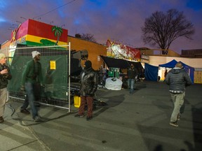 Film crew at the Real Jerk restaurant, site of a video shoot with Drake and Rihanna, in Toronto on Friday February 5, 2016. (Ernest Doroszuk/Toronto Sun)