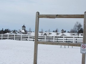 The wood posts are all that remain of a sign on the Bay of St. Lawrence Park. Resident Bill Richard says the broken sign is a symbol of how the park was been ignored by council. Luc Pilon's farm is in the background. (Photo courtesy of Bill Richard)