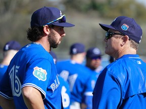Toronto Blue Jays manager John Gibbons (right) and first baseman Chris Colabello (15) talk during practice at Bobby Mattick Training Center in Dunedin, Fla., on Feb. 22, 2016. (Kim Klement/USA TODAY Sports)