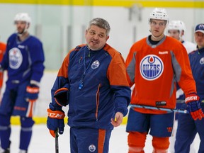 Oilers head coach Todd McLellan talks to players during practice in Leduc Wednesday. (Ian Kucerak)