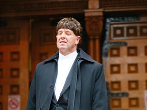 Gregory Michaels leaves Toronto's Old City Hall Wednesday February 24, 2016 after charges were dropped in a dispute with neighbours. (Stan Behal/Toronto Sun)