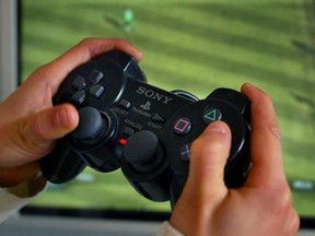 holding video game controller