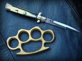 switchblade and brass knucles