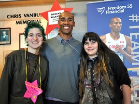 Decathlete Damian Warner poses for a photo with Maureen Anderson (left) and Jess Pereira at the Western Fair District’s Agriplex February 23, 2015. Warner took part in an event called We Are All Stars prior to the 60th Rogers Sports Celebrity Dinner and Auction, where he was named London Sportsperson of the Year. CHRIS MONTANINI\LONDONER\POSTMEDIA NETWORK