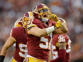 Redskins inside linebacker Will Compton (51) celebrates after a tackle against the Packers during NFC Wild Card playoff action at FedEx Field in Landover, Md., on Jan. 10, 2016. (Tommy Gilligan/USA TODAY Sports)