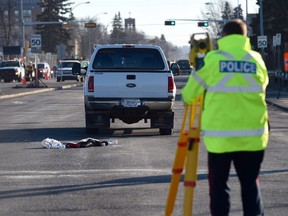 Edmonton Police investigate a truck and pedestrian collision at 111 Ave. and Groat Road that killed an 81 year-old woman. Photo by Shaughn Butts