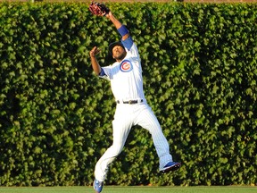 Outfielder Dexter Fowler, ready to sign with the Orioles on Tuesday, changed his mind and will return to Chicago with the Cubs in 2016. (David Banks/AP Photo/Files)