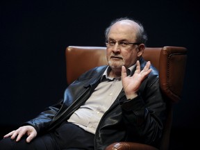 Author Salman Rushdie gestures during a news conference before the presentation of his latest book 'Two Years Eight Months and Twenty-Eight Nights' at the Niemeyer Center in Aviles, northern Spain, October 7, 2015. REUTERS/Eloy Alonso