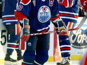Edmonton Oilers team captain Wayne Gretzky, right, and Mark