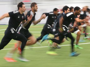 Fury FC players get their legs moving during practice on Feb. 25 at the Branchaud-Briere Complex in Gatineau. (Tony Caldwell, Ottawa Sun)