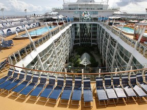 This Nov. 20, 2009, file photo, shows the cruise ship Oasis of the Seas docked at Port Everglades in Fort Lauderdale, Fla. The Oasis of the Seas crew has 10 hours to unload and restock the floating city with a week’s worth of food and supplies. (AP Photo/Hans Deryk, File)