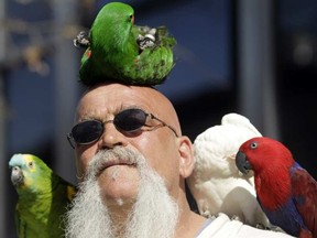 Garry Allen and his parrots were a frequent sight in downtown Ottawa. Allen died Feb. 16 at age 63.