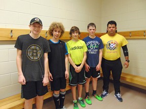 Four of the players who play futsal, better known as indoor soccer, for Huron County have been chosen to play at the provincial level by their London coaches. Their goal as part of the London team is to vie for the Ontario Cup, which is the top level of competition in the province. From left: Connor Pullen of Goderich, Shawn McIlwaine of Goderich, Dawson Hoggart of Londesborough area, Neil Martin of Brussels, London coach Edwin Saraccinik. (Valerie Gillies/Clinton News Record)