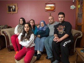 Fuad Zawawi, second from right, with, from left, daughters Farrah and Salwa, wife Eman, mother Salwa and son Mamon. WAYNE CUDDINGTON / POSTMEDIA NETWORK