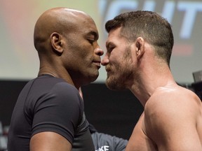 Anderson Silva and Michael Bisping square off during weigh-ins for UFC Fight Night at O2 Arena. (Per Haljestam/USA TODAY Sports)