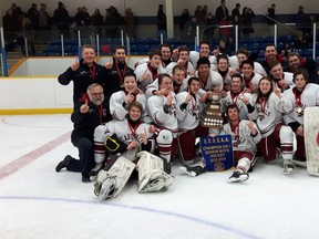 St. Charles College Cardinals boys hockey team celebrates their Division I city championship win at Garson Arena on Friday. The Cards won the deciding Game 5, 4-2.