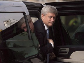 Then-outgoing prime minister Stephen Harper arriving at his Langevin office in Ottawa on Wednesday, Oct. 21, 2015. (THE CANADIAN PRESS/Adrian Wyld)