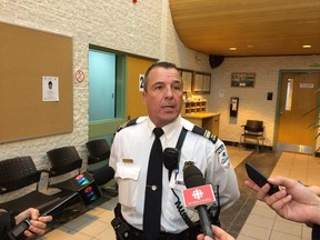 Gatineau police Lieut. Jean-François Beauchamp speaks to reporters Saturday about a mysterious incident in which a man was found beaten inside an Aylmer home.