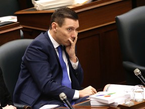Ontario Progressive Conservative Leader Patrick Brown looks on as the 2016 budget is read at Queen's Park in Toronto on February 25, 2016. (Craig Robertson/Toronto Sun/Postmedia Network)