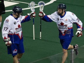 Toronto Rock's Kasey Beirnes (right) scored six goals against Rochester on Saturday night. (POSTMEDIA NETWORK FILES)