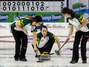 Kendra Lilly, middle,  third for Krista McCarville's Northern Ontario rink, delivers a rock, during Draw 11 of the Scotties Tournament of Hearts on Wednesday February 24, 2016 at Revolution Place in Grande Prairie, Alta. Logan Clow/Grande Prairie Daily Herald-Tribune/Postmedia Network