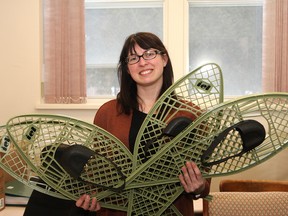 Jessica Watts, of the Greater Sudbury Public Library, shows snowshoes that can be taken out at six of the Greater Sudbury Library locations. People can borrow the snowshoes for one week at a time, and will require a library card to sign them out. The new initiative is a partnership with the City of Greater Sudbury, Nickel District Conservation Area, Rainbow Routes and the Healthy Kids Community Challenge. The library locations include the South End, Garson, Lively, Onaping/Levack, Valley East and the main Library branch. John Lappa/Sudbury Star/Postmedia Network