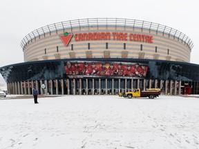 A Canadian Tire Centre employee stands in front of the building while the doors are open to vent out the building during an evacuation this morning due to a foul odour. The Hazmat team was called on site prior to the start of a Disney On Ice show in Ottawa on February 28, 2016. (Jana Chytilova/Postmedia Network)