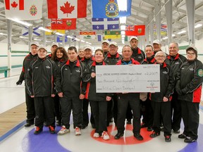 Members of the Kingston and District Special Olympics curling team, The Shot Rocks, received a $2,200 donation at the Garrison Golf and Curling Club on Sunday. The money was raised during Al Davis's annual Alfie's Open charity curling bonspiel. (Julia McKay/The Whig-Standard)