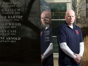 Thirteen of the 25 names inscribed on the London Firefighters? Memorial Monument outside Station 1 on Horton Street belong to firefighters who had cancer, says Jason Timlick, president of London Professional Firefighters Association, who welcomes a nearly $10-million injection to the city?s workplace injury fund to compensate victims. (CRAIG GLOVER, The London Free Press)