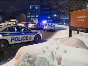 Police raced to Carleton University after reports of shots being fired, only to find that the noise was coming from balloons being popped. CHRIS ROUSSAKIS / POSTMEDIA