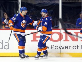 John Tavares, right, shown here with teammate Johnny Boychuk, expects if the Islanders make a move before the trade deadline, it will be to add pieces for a playoff push. (USA TODAY SPORTS)