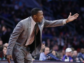 Toronto Raptors head coach Dwane Casey reacts on the sidelines during the second half of an NBA basketball game against the Detroit Pistons, Sunday, Feb. 28, 2016, in Auburn Hills, Mich. (AP Photo/Carlos Osorio)