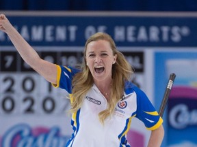 Alberta skip Chelsea Carey celebrates her win over Northern Ontario during the gold-medal game at the Scotties Tournament of Hearts yesterday in Grande Prairie, Alta. (The Canadian Press)