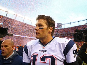 New England Patriots quarterback Tom Brady reacts as he leaves the field following the game against the Denver Broncos in the AFC Championship football game at Sports Authority Field at Mile High. The Broncos defeated the Patriots 20-18. Mark J. Rebilas-USA TODAY Sports