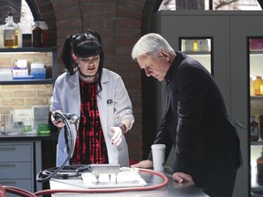 In this image released by CBS, Pauley Perrette, left, and Mark Harmon appear in a scene from "NCIS."  (Michael Yarish/CBS)