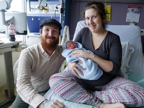 Emily Mountney-Lessard/The Intelligencer
Emrick Kevin Porter was one of four (as of 4 p.m.) Leap Year Day babies born at Belleville General Hospital on Monday in Belleville. He is shown here with parents Michael Porter and Madison Scott.