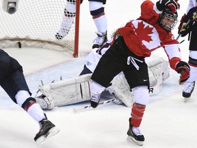 Marie-Philip Poulin (front) was named to the the 23-player squad that will represent Canada at the 2016 Women's World Hockey Championships in Kamloops, B.C., beginning March 28. (Postmedia Network/Files)