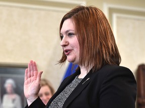 Brandy Payne being sworn in as associate minister of health as Premier Rachel Notley increased the size of cabinet by six ministers Tuesday during a ceremony at Government House in Edmonton, February 2, 2016.