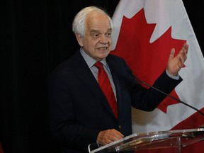 Immigration, Refugees and Citizenship Minister John McCallum speaks about the next influx of Syrain refugees who arrived at Pearson International Airport on Monday, February 29, 2016. (Jack Boland/Toronto Sun)