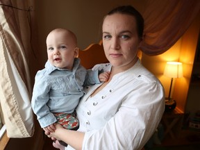 Kingston's Melodie Ballard can say she and her nine-month-old son, Ezra, inspired a private member's bill in the House of Commons in Ottawa. (Elliot Ferguson/The Whig-Standard)