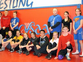 A total of 20 wrestlers from Lambton County high schools will be competing at OFSAA in Windsor March 1-2. Back row from left are Julie Cumming, Elijah Wright, Taryn Robinson, Cole Anderson, Bella McGill and Greg Wilson. Front row from left are Adam VanderSlagt, Tali Allen, Kyla Klauke, Erin Cromwell, Hannah VanderSlagt, Nathan Morro, Lauren Ellenor and Nathan McMillan. Absent are Thomas Robertson, Jake Williams, Ben Williams, Gavin Whiteeye, James Crummer and Brianna Boursma. (Terry Bridge/Sarnia Observer/Postmedia Network)