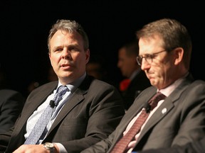 Jets general Kevin Cheveldayoff (left) and owner Mark Chipman, have been careful with the money they hand out for contracts.