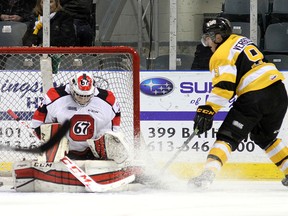Kingston Frontenacs' Ryan Verbeek scores the game's first goal on Ottawa 67's goalie Leo Lazarev during Ontario Hockey League action at the Rogers K-Rock Centre on Monday night. (Ian MacAlpine/The  Whig-Standard)