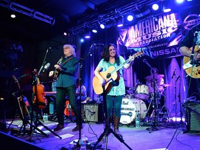 Ricky Skaggs, Sharon White, and Ry Cooder perform at 3rd and Lindsley for the Americana Music Festival at on September 17, 2015 in Nashville, Tennessee. (Getty Images for Americana Music/AFP)