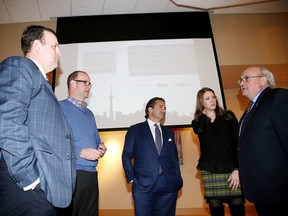 Jamie Lamont, second left, and Perry Dellelce, co-chairs of Toronto celebrates Sudbury, chat with beneficiaries of this year's Nickel Anniversary event at the launch of this year's fundraiser in Sudbury, Ont. on Monday February 29, 2016. Looking on is Guy Labine, left, of Science North, Tammy Frick of Cinefest and Dr. Denis Roy of Health Sciences North. Toronto Celebrates Sudbury was born from an idea to bring together current and former Sudburians to raise funds for local Sudbury charitable organizations while having some fun doing it. This year's beneficiaries are Science North, Cinefest and Health Sciences North NEO Kids. Gino Donato/Sudbury Star/Postmedia Network