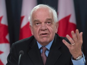 Immigration Minister John McCallum updates the media on the Syrian refugees arriving in Canada.